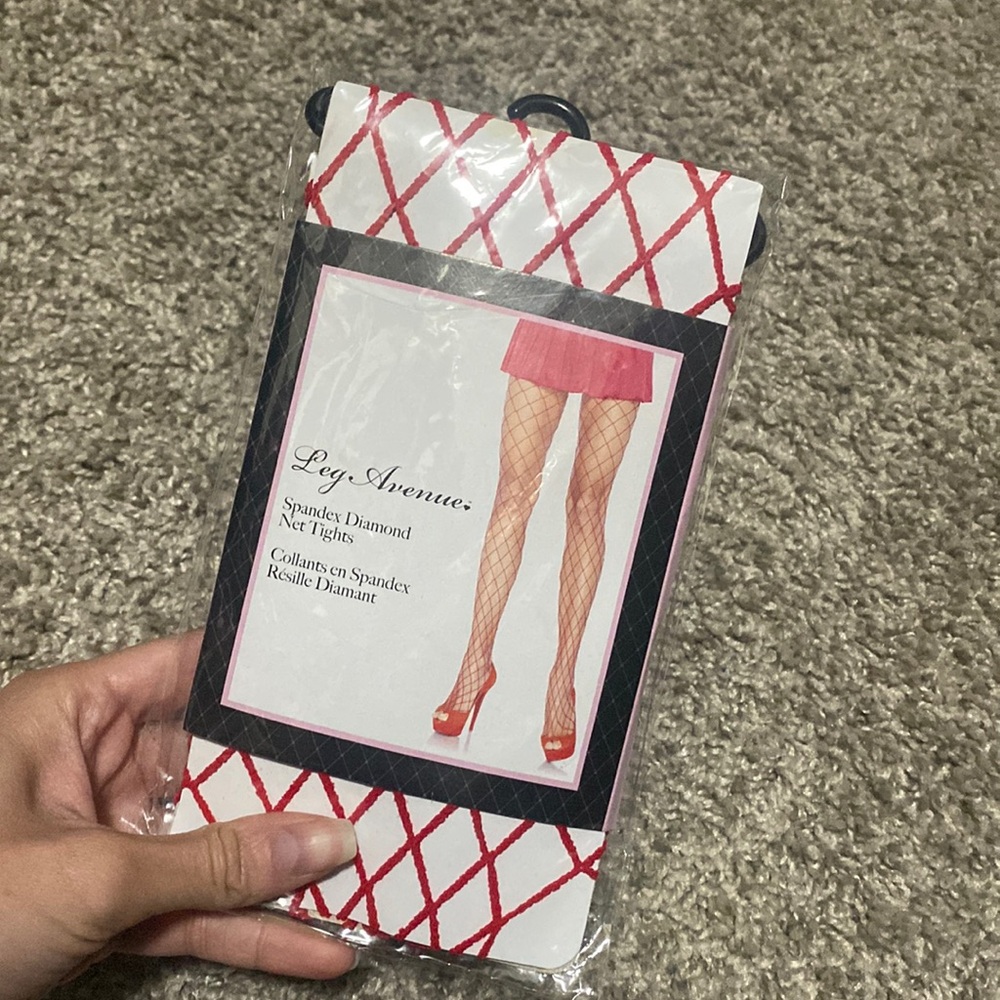 New, never opened red diamond net tights
